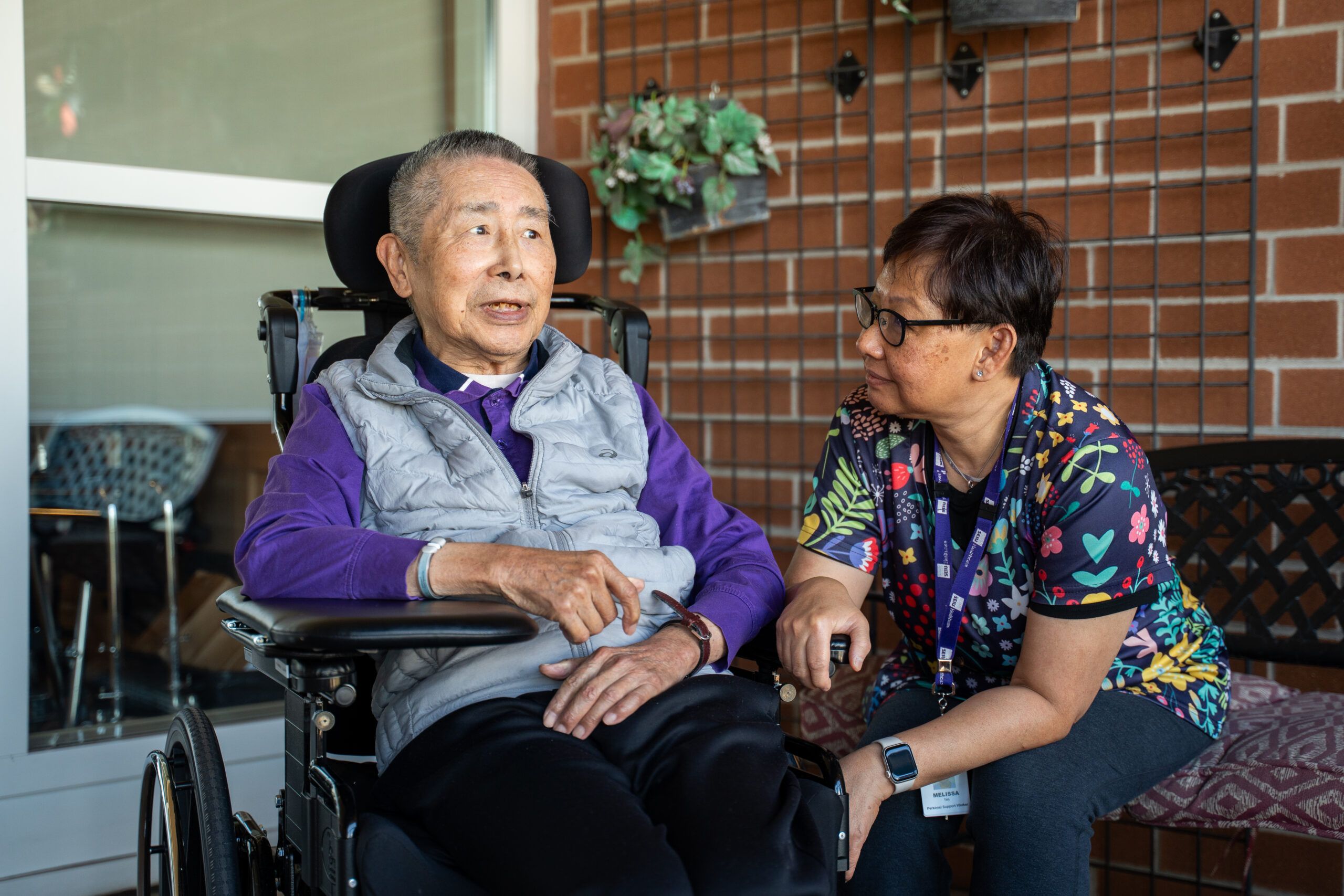 Personal Support Worker Melissa The and resident Kie Cheung Chue at Yee Hong Mississauga.